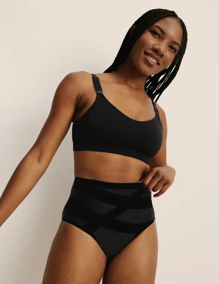 Gin is a 34DD and wearing KNIX M+ | Full-body view of model wearing the BlissFit™ Nursing Bra, highlighting the neckline, nursing clip strap design, and smooth silhouette | Black