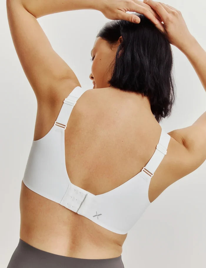 | Front view of model highlighting the coverage and fit | White
