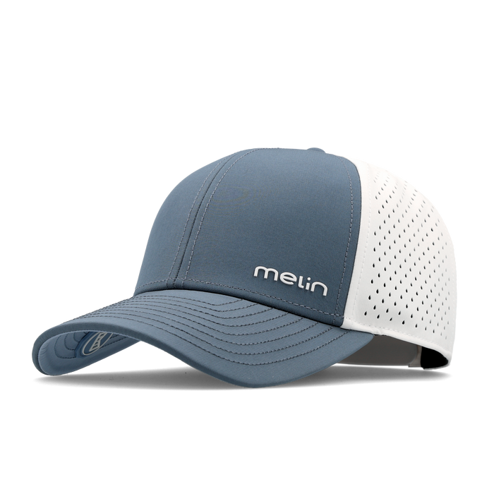 The angled view of the melin Vintage Fit Compass Hydro hat in clear lake