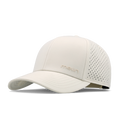The angled view of the melin Vintage Fit Compass Hydro hat in egret