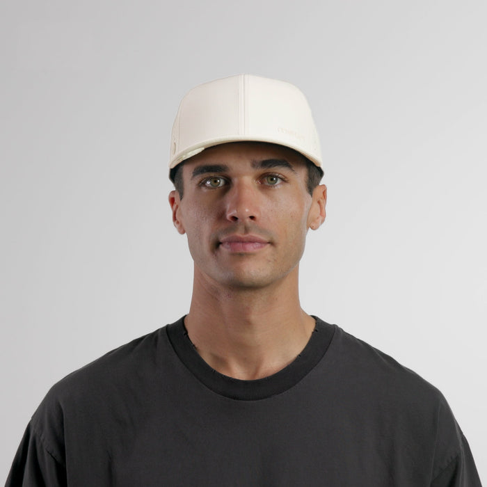 The model-image of the melin Vintage Fit Compass Hydro hat in egret