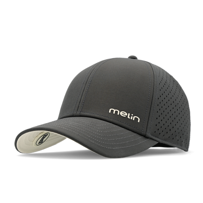 The angled view of the melin Vintage Fit Compass Hydro hat in faded black