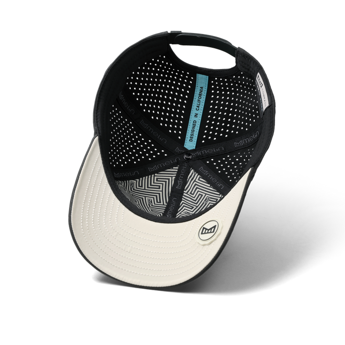 The inside view of the melin Vintage Fit Compass Hydro hat in faded black