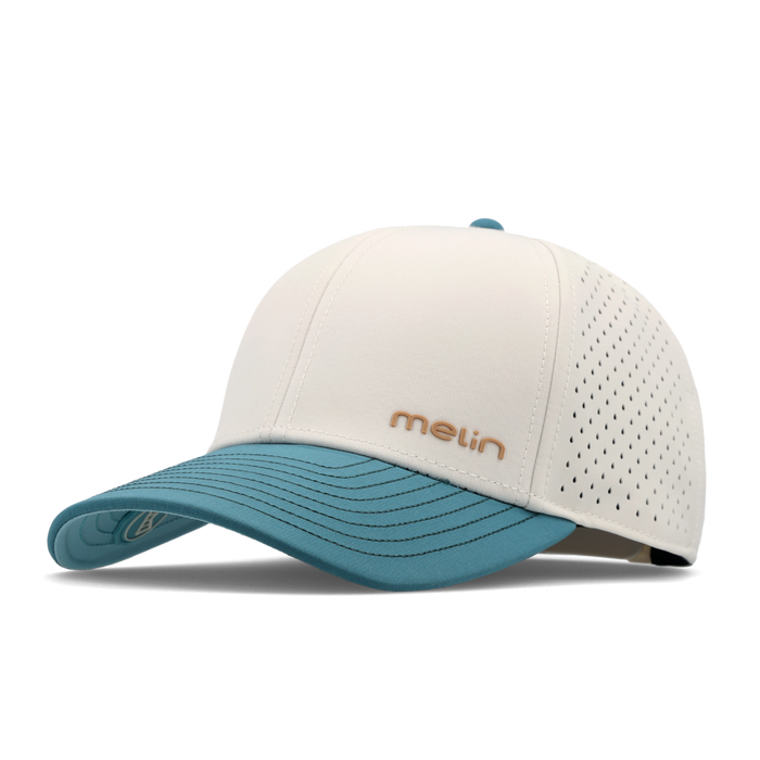 The angled view of the melin Vintage Fit Compass Hydro hat in riverwalk