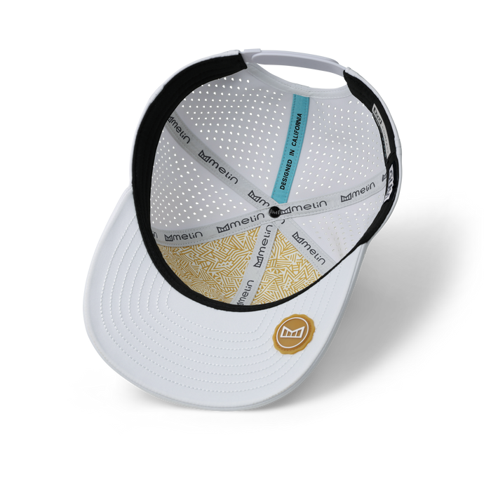 The inside view of the melin Compass Hydro  Vintage Fit in  White / Gum