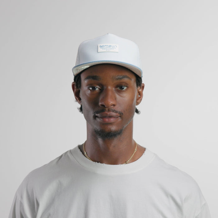 The model-image of the melin Split Crushed Fit Coronado Brick Hydro hat in clear lake