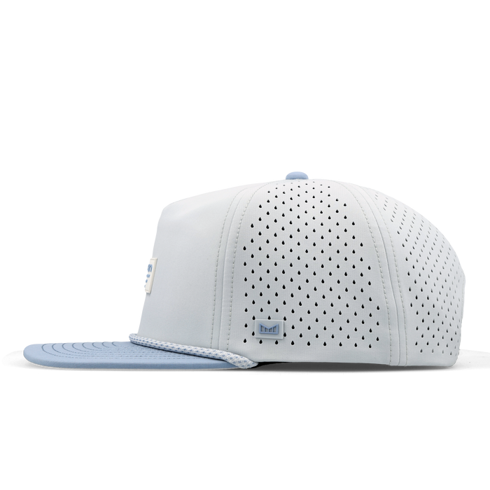 The side view of the melin Split Crushed Fit Coronado Brick Hydro hat in clear lake