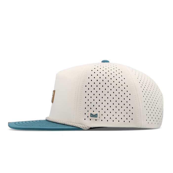 The side view of the melin Split Crushed Fit Coronado Brick Hydro hat in riverwalk