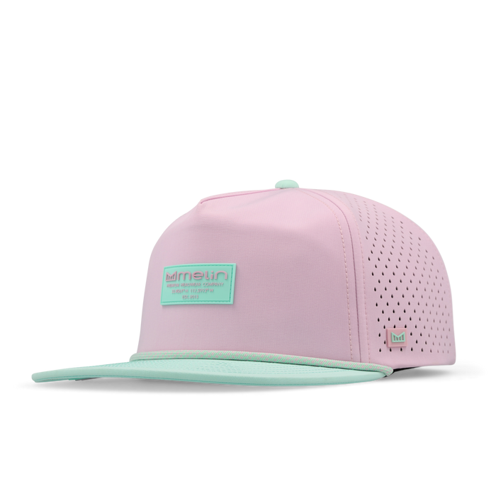 The angled view of the melin Split Crushed Fit Coronado Brick Hydro hat in south beach