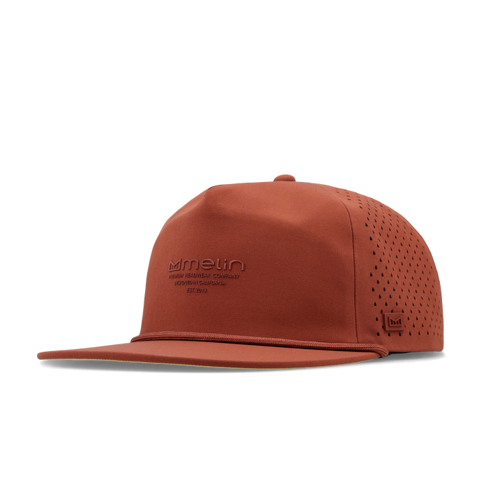 The angled view of the melin Split Crushed Fit Coronado Hydrolite hat in burnt brick