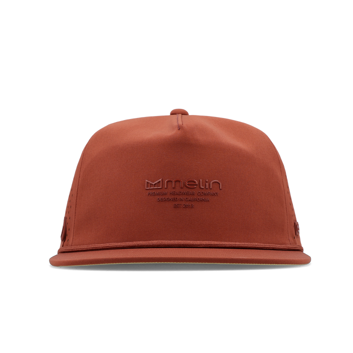 The frontal view of the melin Split Crushed Fit Coronado Hydrolite hat in burnt brick