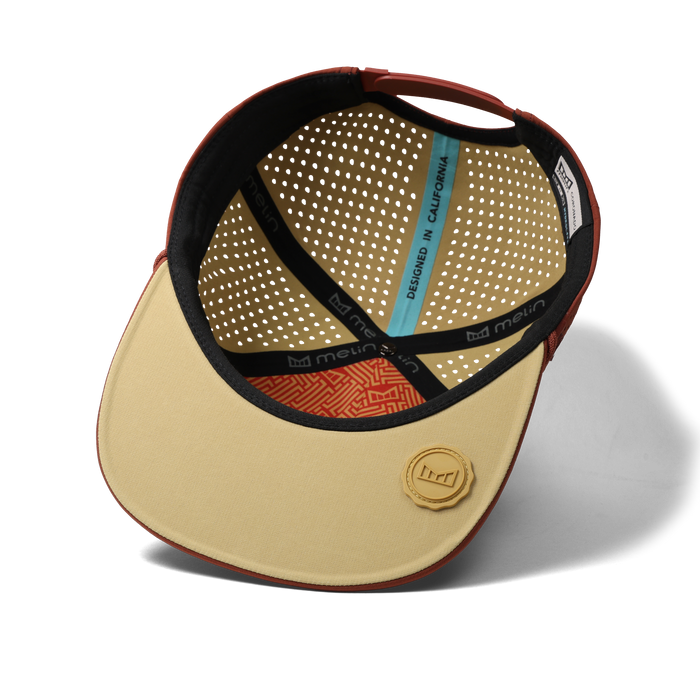 The inside view of the melin Split Crushed Fit Coronado Hydrolite hat in burnt brick