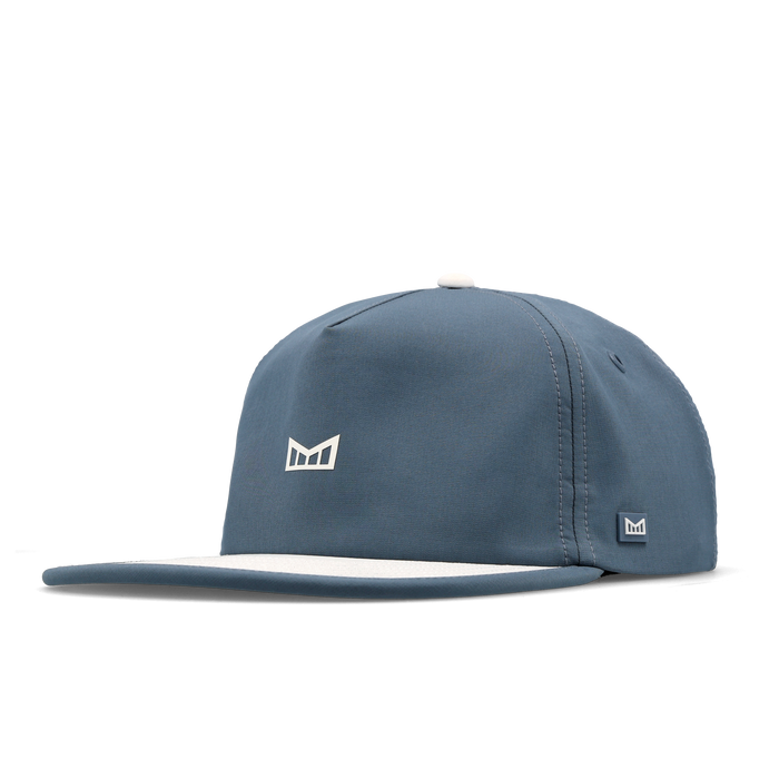The angled view of the melin Split Crushed Fit Eagle Icon Hydro hat in clear lake
