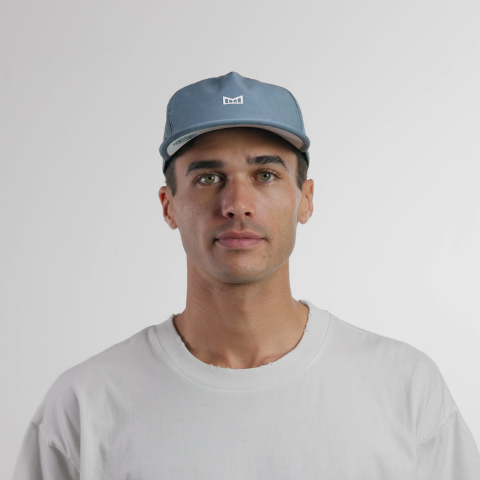 The model-image of the melin Split Crushed Fit Eagle Icon Hydro hat in clear lake