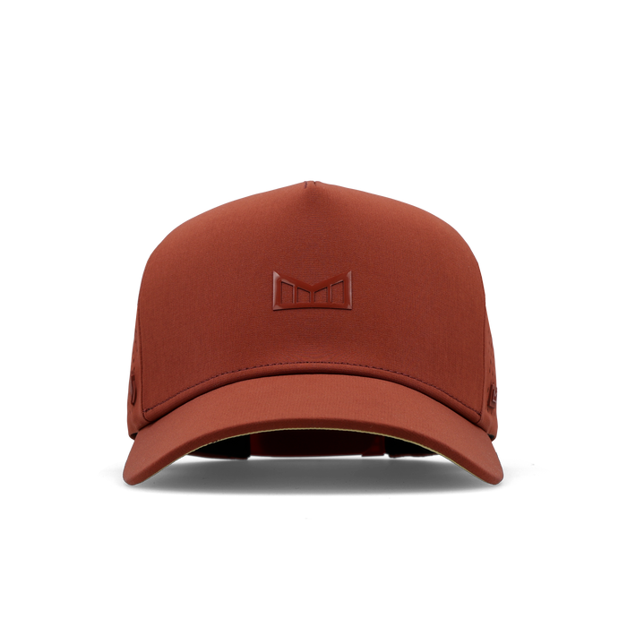 The frontal view of the melin Split Fit Odysea Hydrolite hat in burnt brick