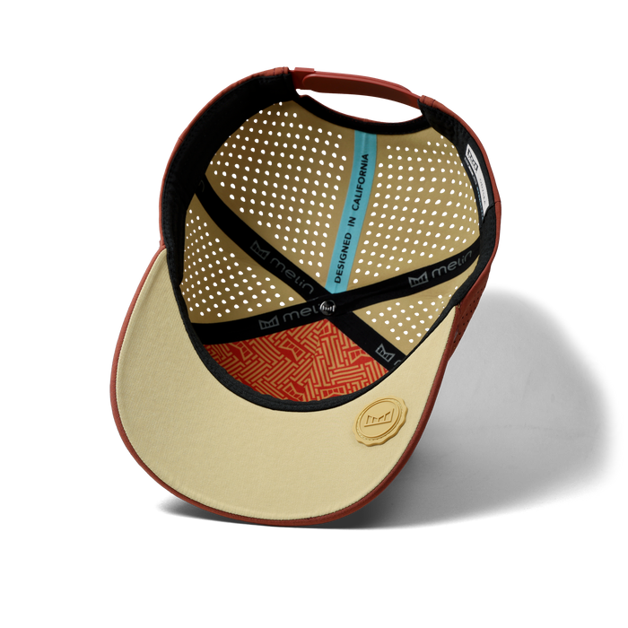 The inside view of the melin Split Fit Odysea Hydrolite hat in burnt brick