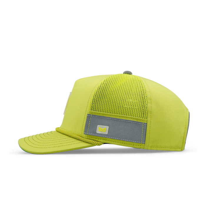 The side view of the melin Odysea Links Trashed Hydro  Split Fit in  Safety Green