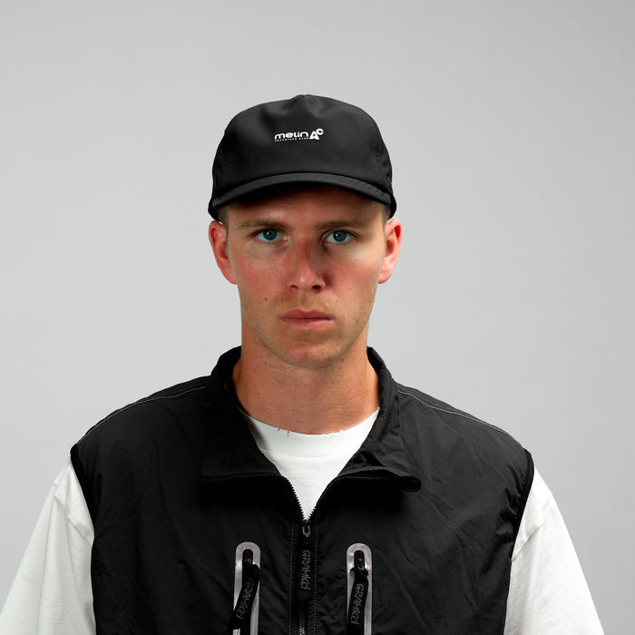 The model-image of the Melin Split Fit Odysea Packable Hydro hat in Black