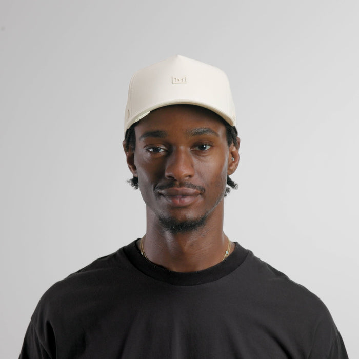 The model-image of the melin Split Fit Odysea Rope Bulls Icon Hydro hat in egret