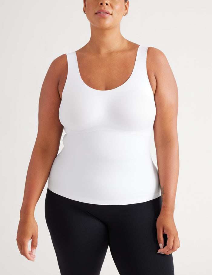 Candice is a 40DD and wears a Knix size XXL | Front view of model wearing the LuxeLift Scoop Neck Tank, highlighting the neckline, strap design, and silhouette | White