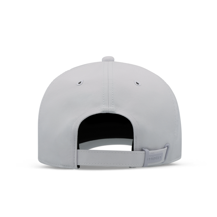 The back view of the melin The Legend Hydro  Performance Dad Hat in  White / Gum