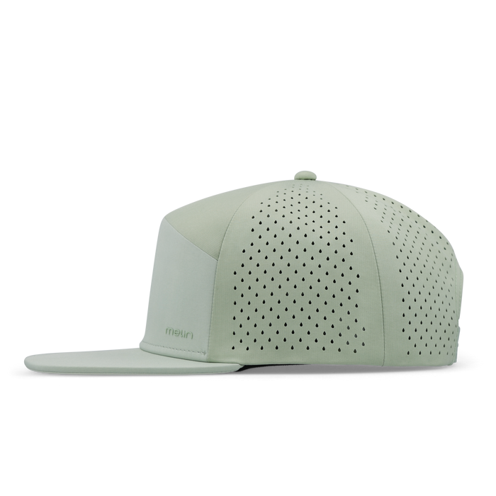 The side view of the melin Horizon Fit Trenches Hydrolite hat in dusty mint