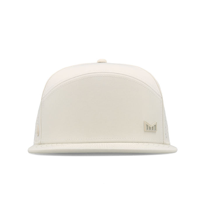 The frontal view of the melin Horizon Fit Trenches Icon Hydro hat in egret