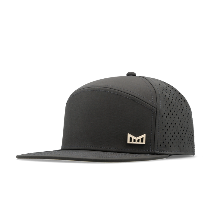 The angled view of the melin Horizon Fit Trenches Icon Hydro hat in faded black