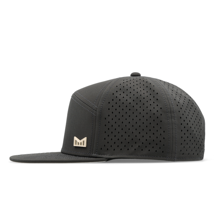 The side view of the melin Horizon Fit Trenches Icon Hydro hat in faded black