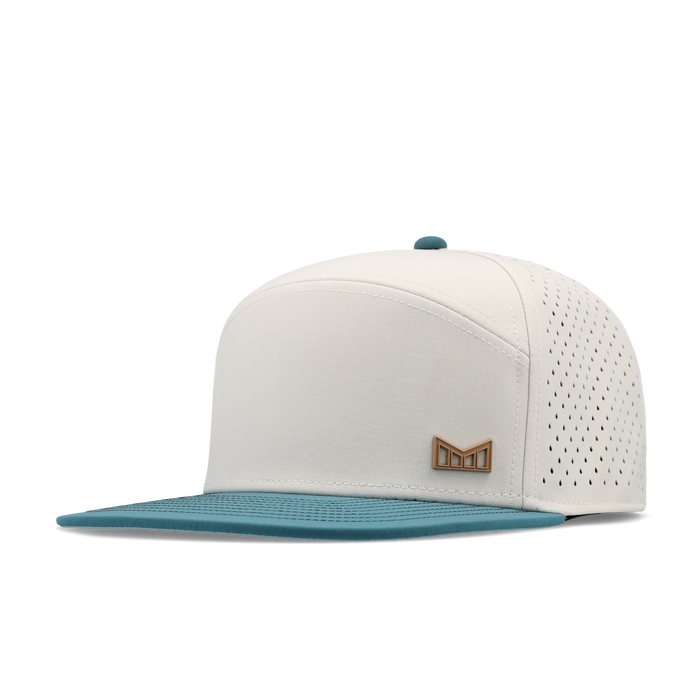 The angled view of the melin Horizon Fit Trenches Icon Hydro hat in riverwalk